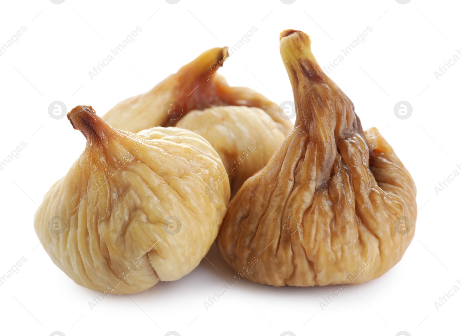Photo of Pile of tasty dried figs isolated on white