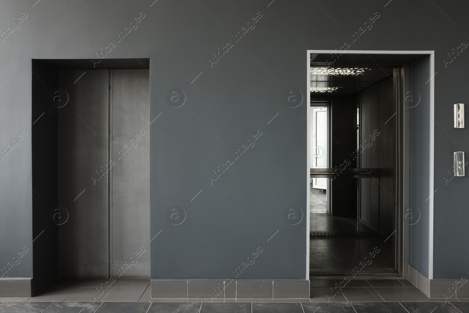 Photo of Stylish elevator with open and close doors