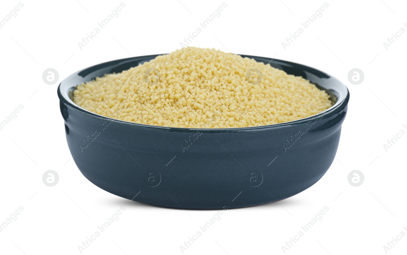 Photo of Bowl of raw couscous isolated on white