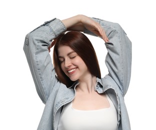 Portrait of smiling woman on white background