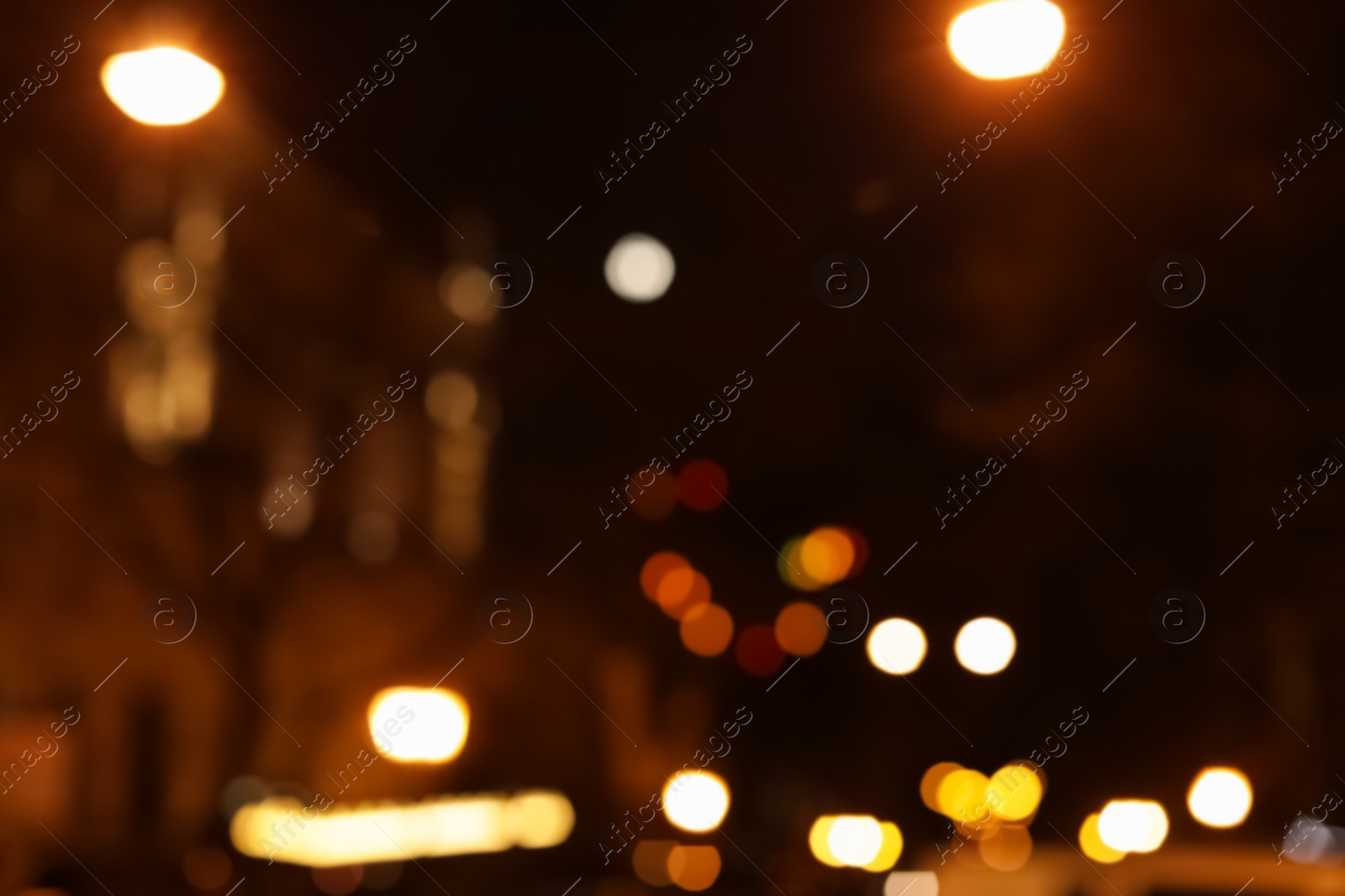 Photo of Beautiful street lights at night. Bokeh effect