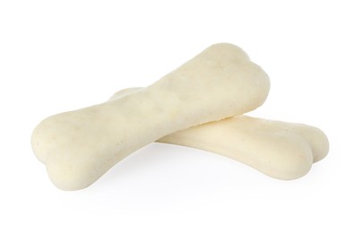 Photo of Bone shaped dog cookies on white background