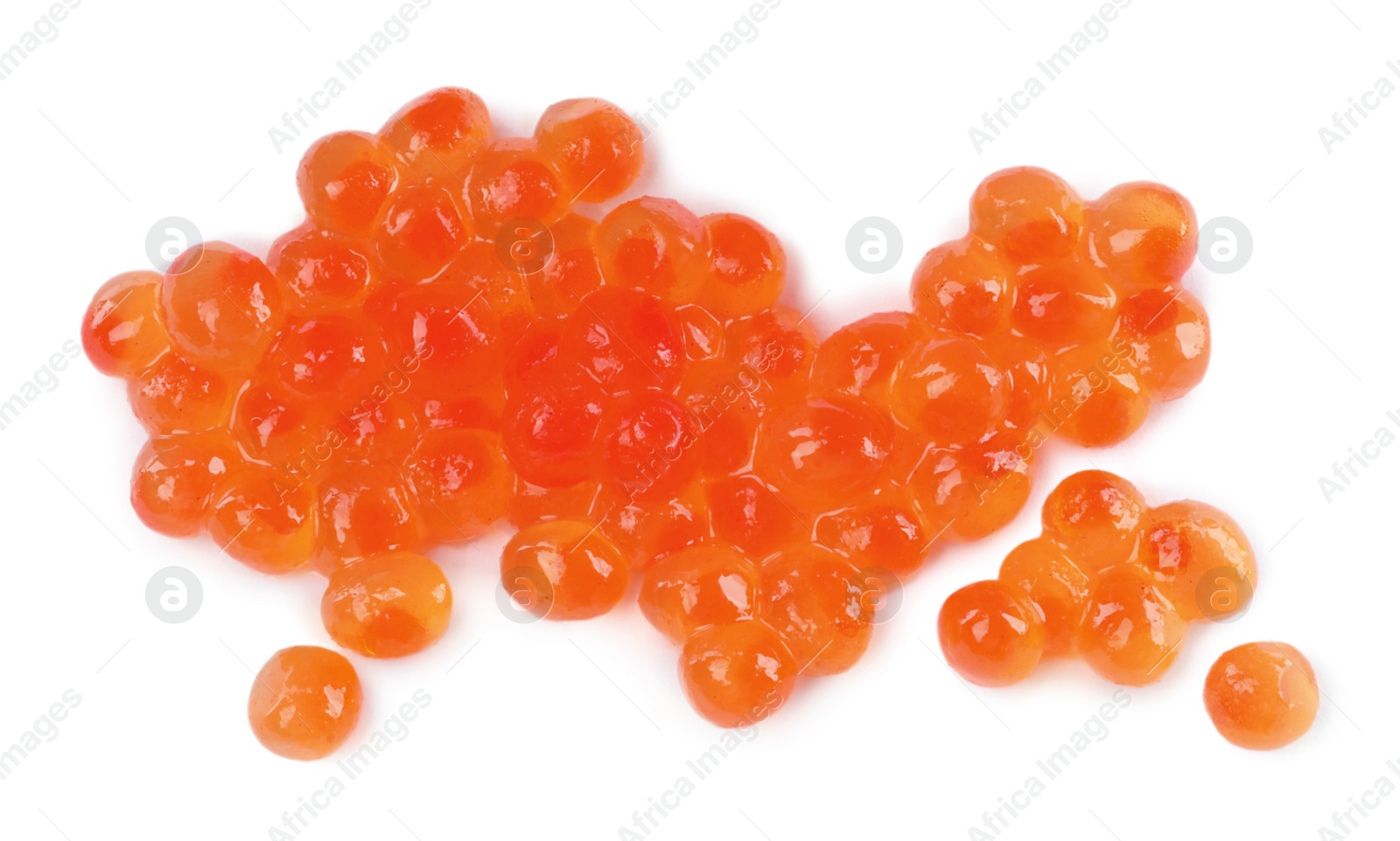 Photo of Pile of delicious red caviar isolated on white, top view