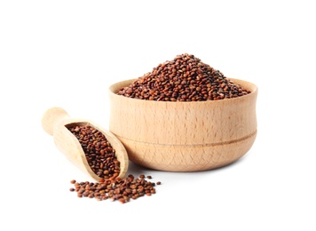 Bowl and scoop with red quinoa on white background