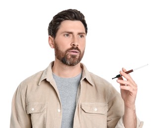 Man using cigarette holder for smoking isolated on white