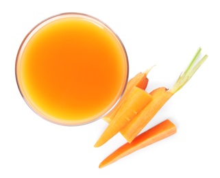 Photo of Glass of freshly made carrot juice on white background, top view
