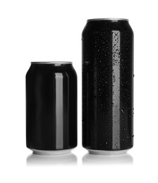 Photo of Aluminum cans with drinks on white background