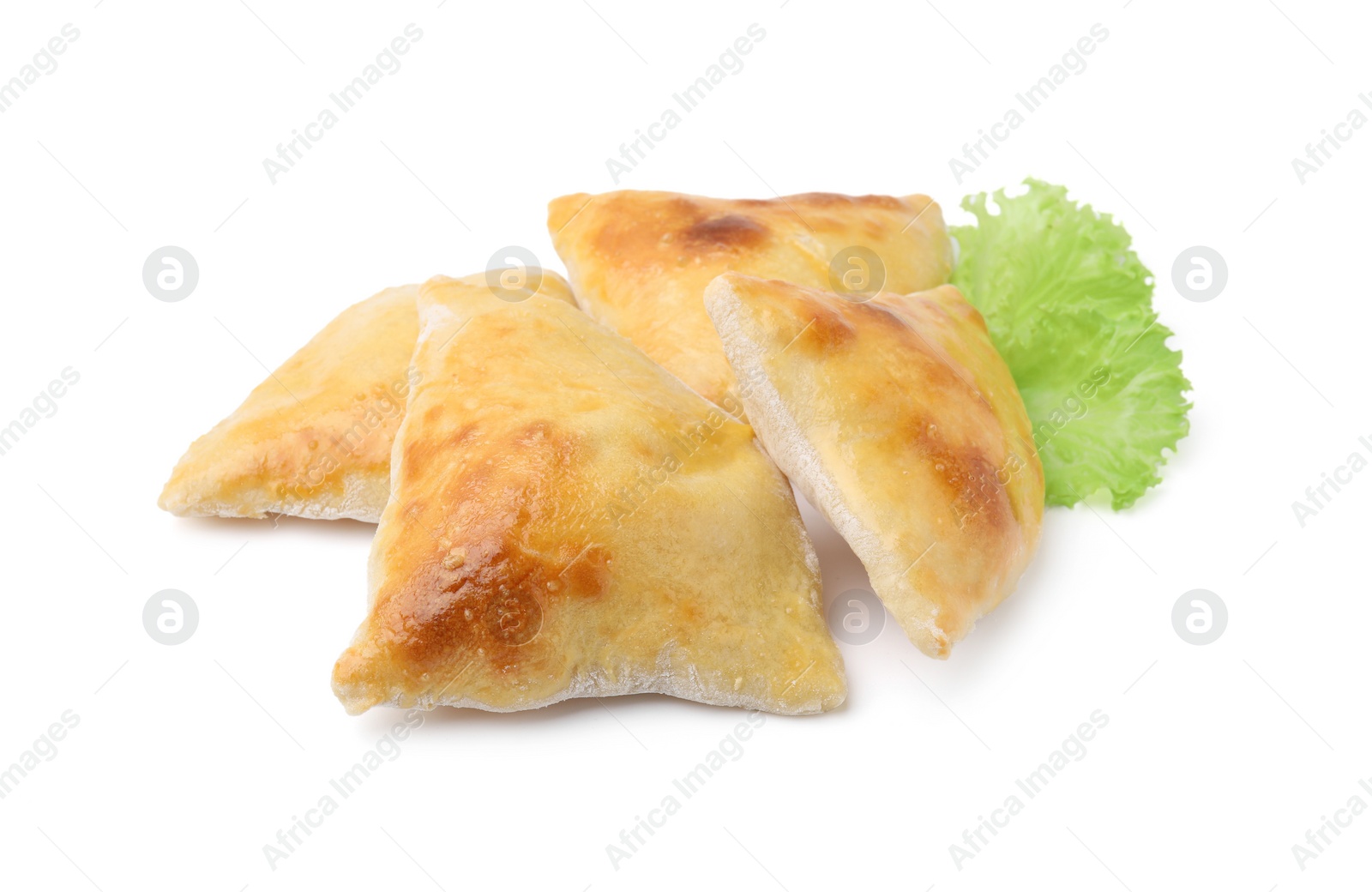 Photo of Delicious samosas and lettuce isolated on white