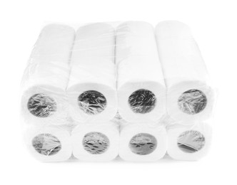 Package with many soft toilet paper rolls isolated on white