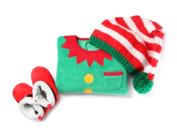 Photo of Cute elf jumper, hat and booties on white background, top view. Christmas baby clothes