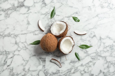 Flat lay composition with coconuts on marble  table