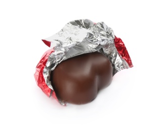 Photo of Heart shaped chocolate candy in red foil on white background