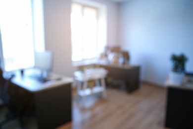 Photo of Defocused bokeh view of modern office interior