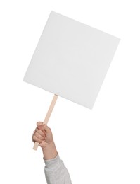 Photo of Woman holding blank protest sign on white background, closeup