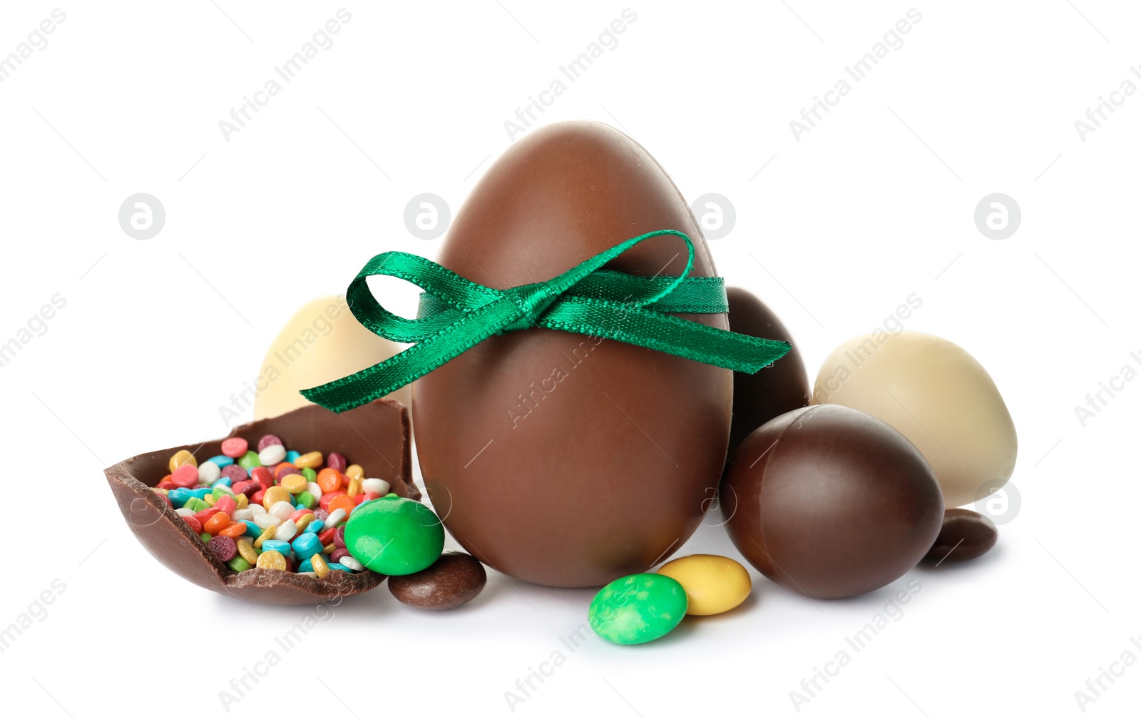 Photo of Composition with chocolate Easter eggs on white background