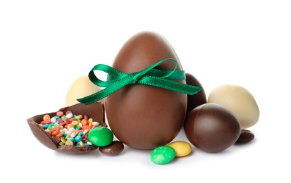 Photo of Composition with chocolate Easter eggs on white background