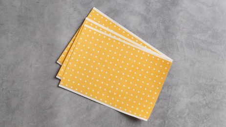 Photo of Pepper plasters on grey textured background, top view