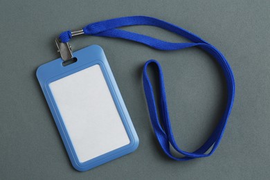 Photo of Blank badge on grey background, top view. Mockup for design