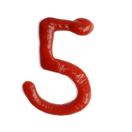 Photo of Number 5 written with ketchup on white background