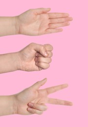 Image of People playing rock, paper and scissors on pink background, closeup