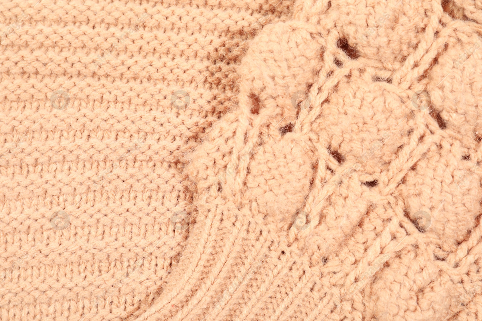 Photo of Texture of cozy warm sweater as background, closeup