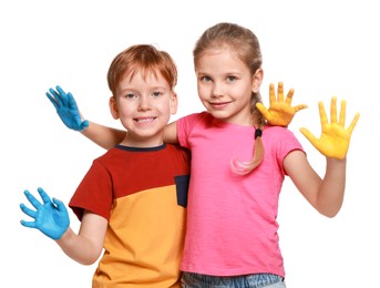 Photo of Little girl and boy with hands painted in Ukrainian flag colors on white background. Love Ukraine concept