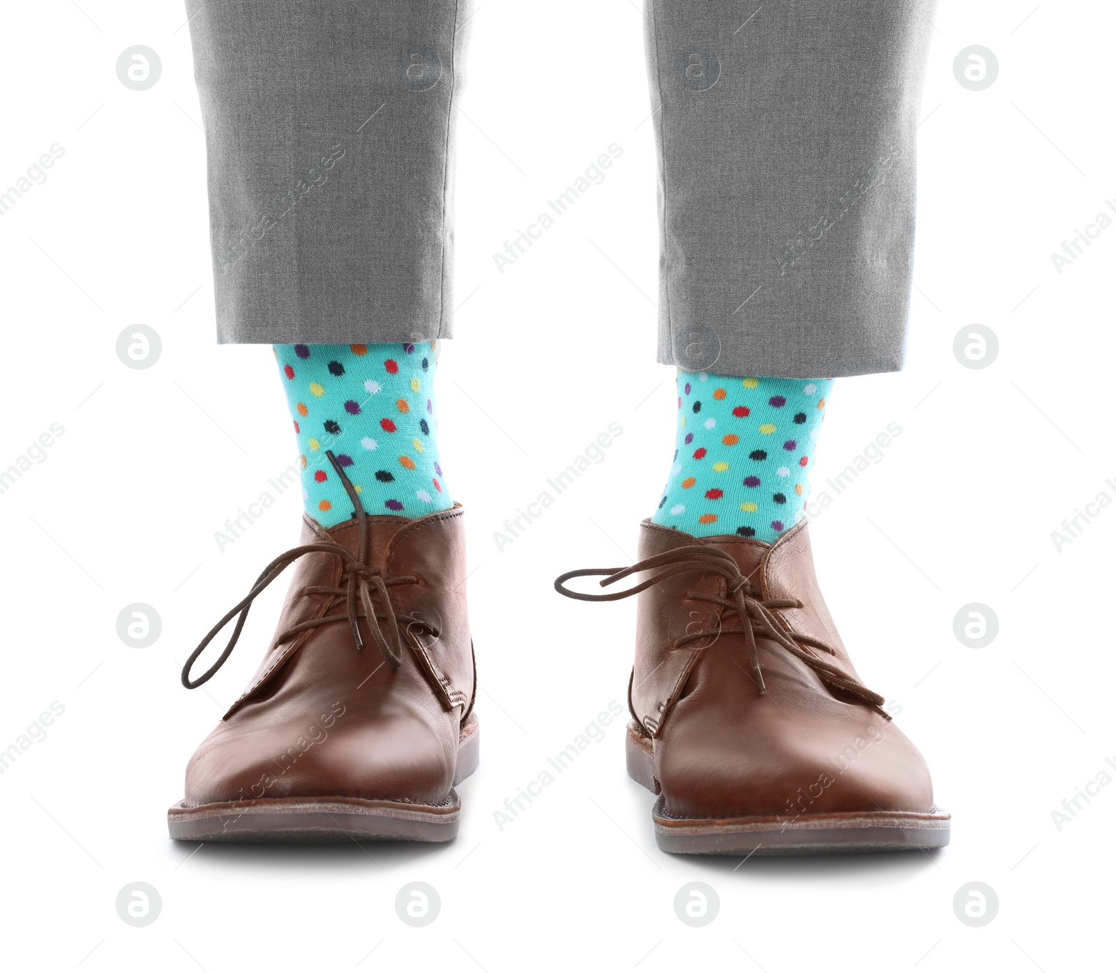 Photo of Man wearing stylish socks and shoes on white background, closeup