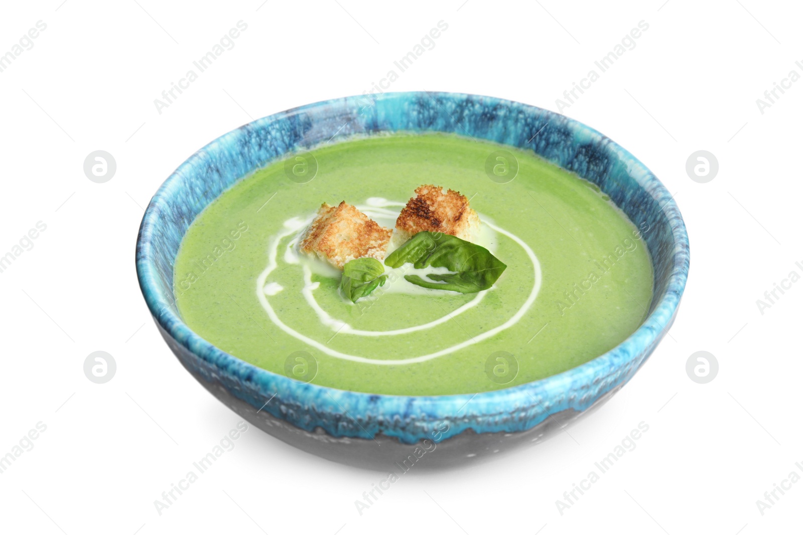 Photo of Delicious broccoli cream soup with croutons isolated on white