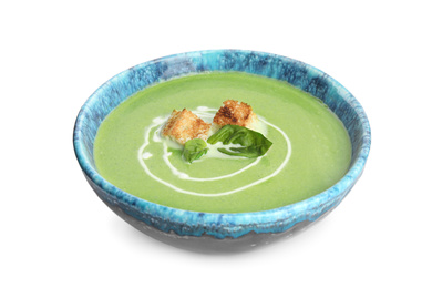 Delicious broccoli cream soup with croutons isolated on white