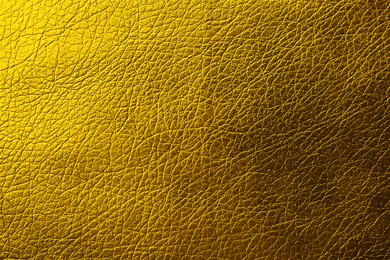 Image of Golden textured surface as background, closeup view