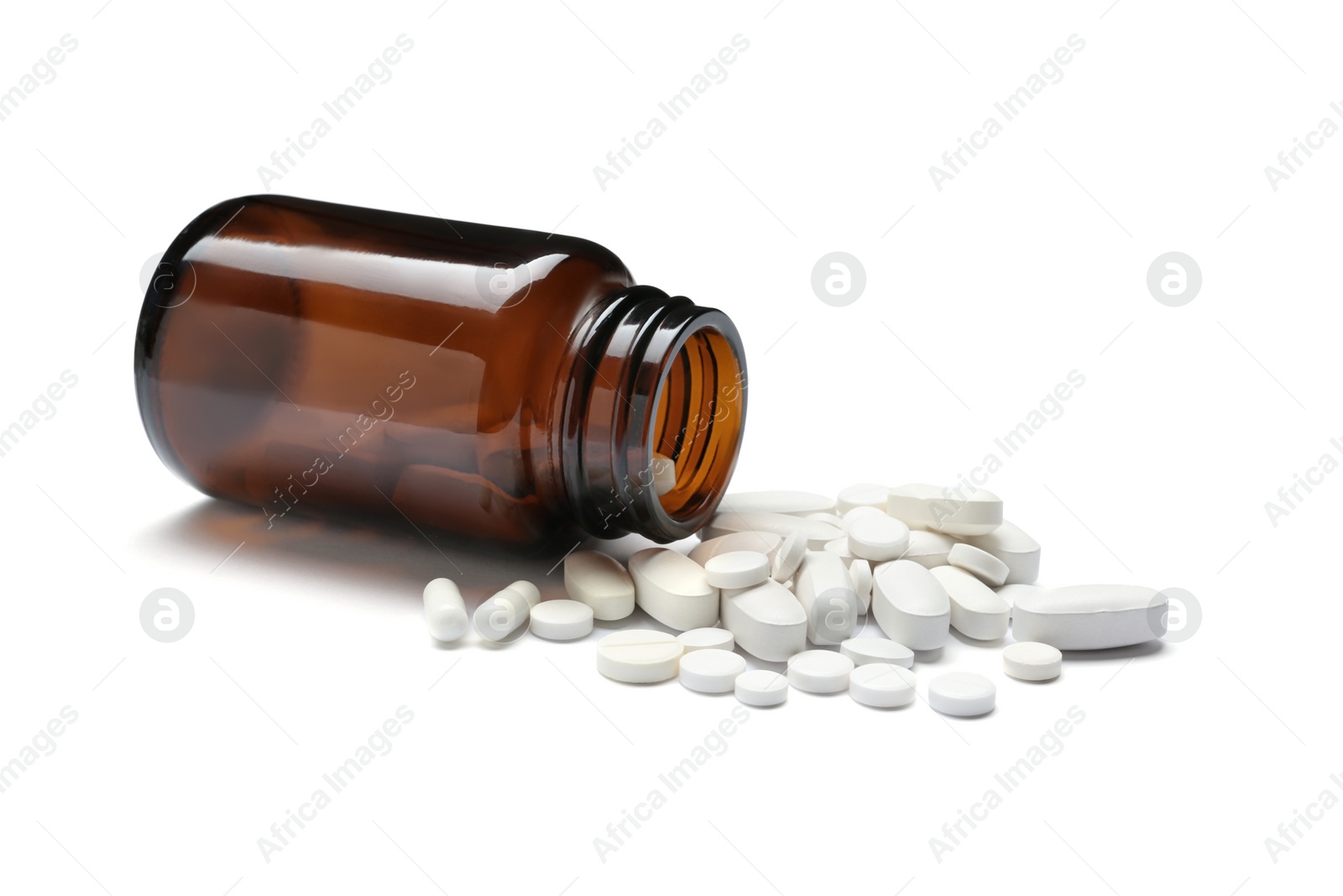 Photo of Bottle with vitamin pills on white background