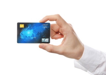 Photo of Young man holding credit card on white background