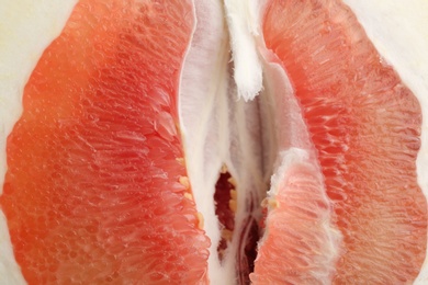 Photo of Fresh cut red pomelo fruit as background, closeup