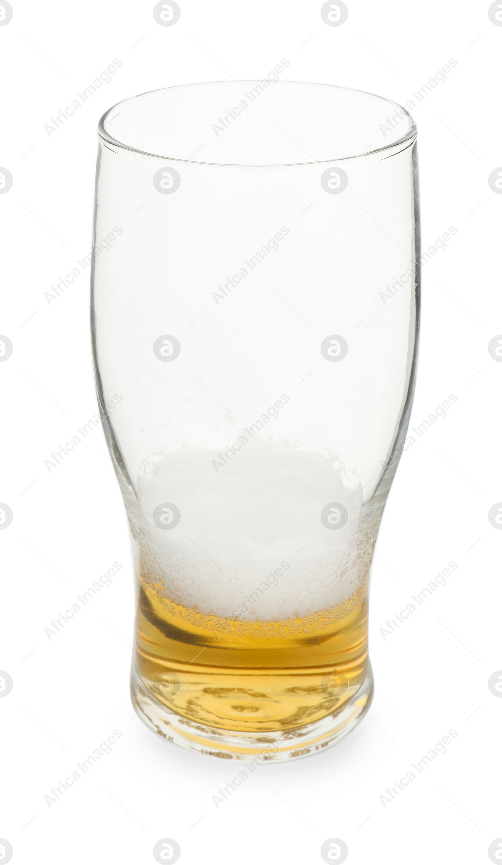 Photo of Almost empty glass of beer isolated on white