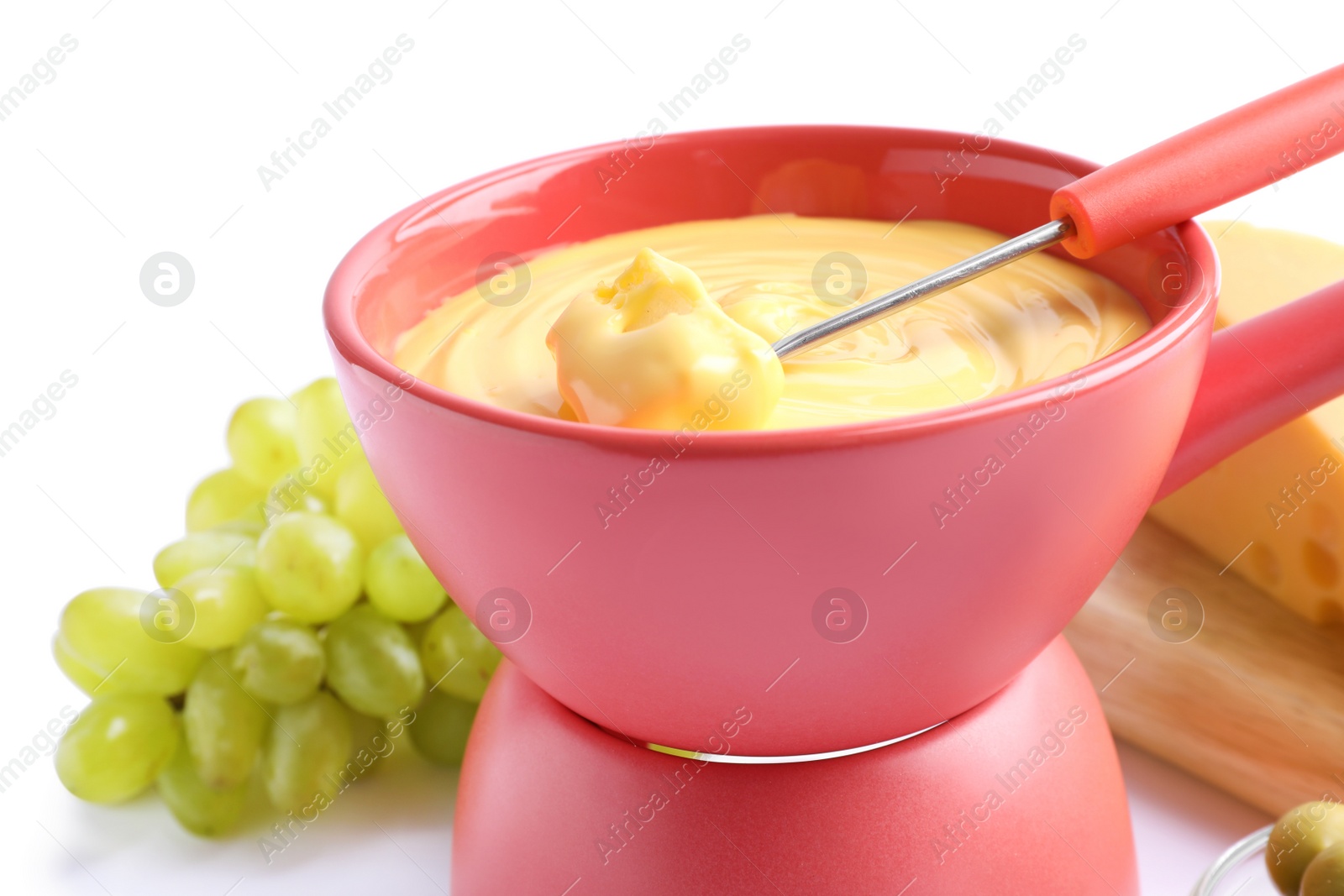 Photo of Delicious cheese fondue with grapes on white background, closeup