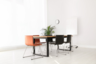 Image of Blurred view of modern office interior 