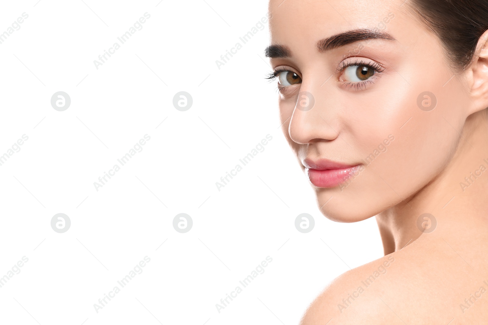 Photo of Portrait of young woman with beautiful face against white background