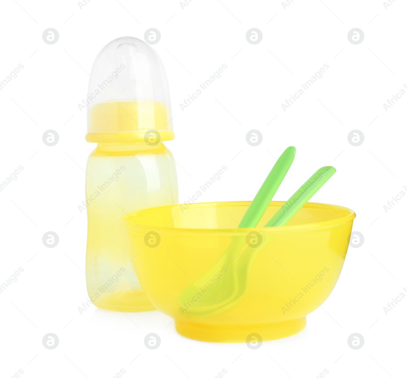 Photo of Set of plastic dishware isolated on white. Serving baby food