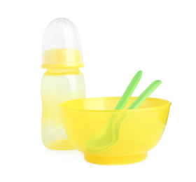 Set of plastic dishware isolated on white. Serving baby food