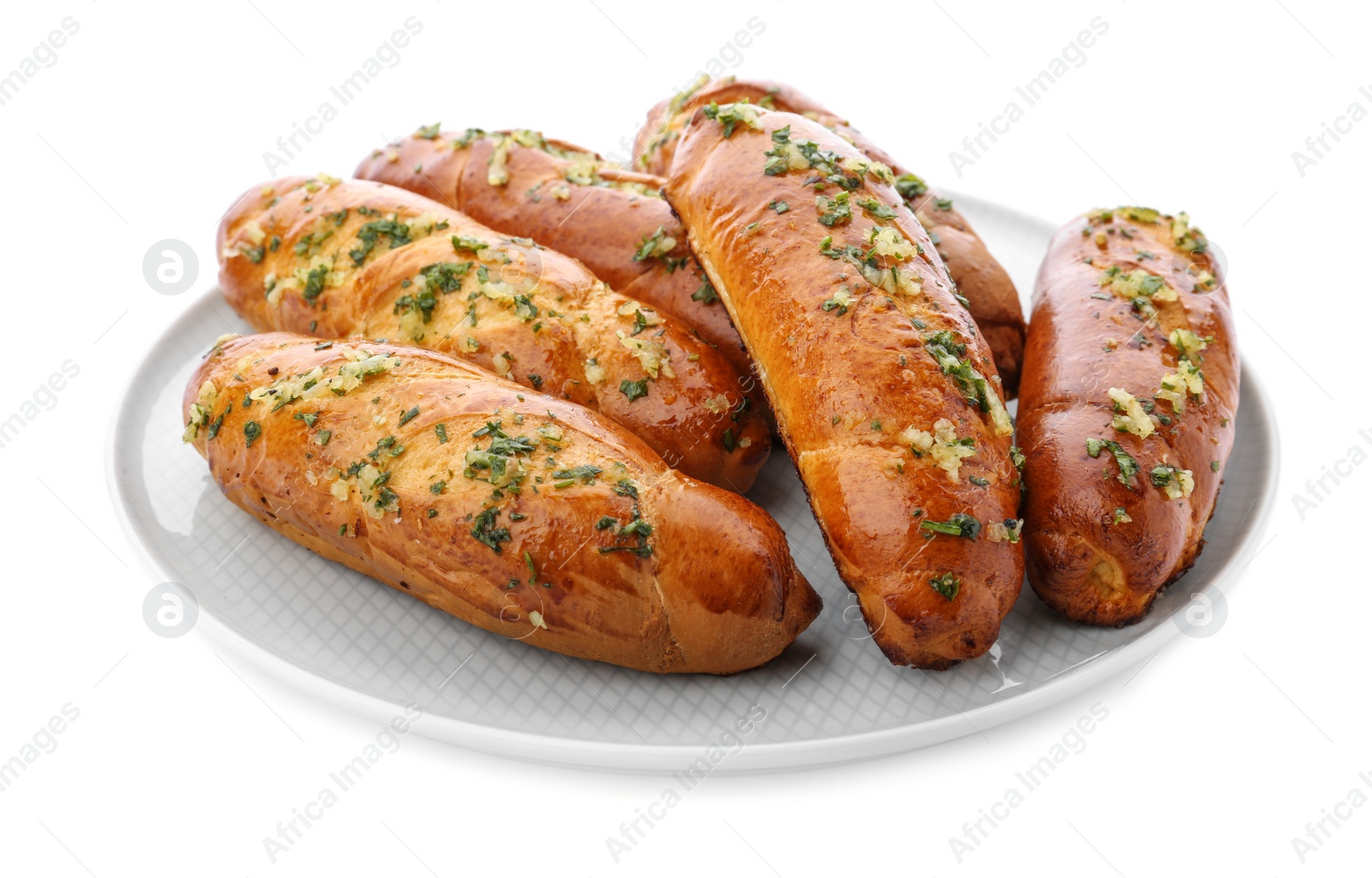 Photo of Plate of bread loaves with garlic and herbs on white background