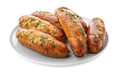 Photo of Plate of bread loaves with garlic and herbs on white background