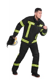 Photo of Full length portrait of firefighter in uniform with helmet on white background