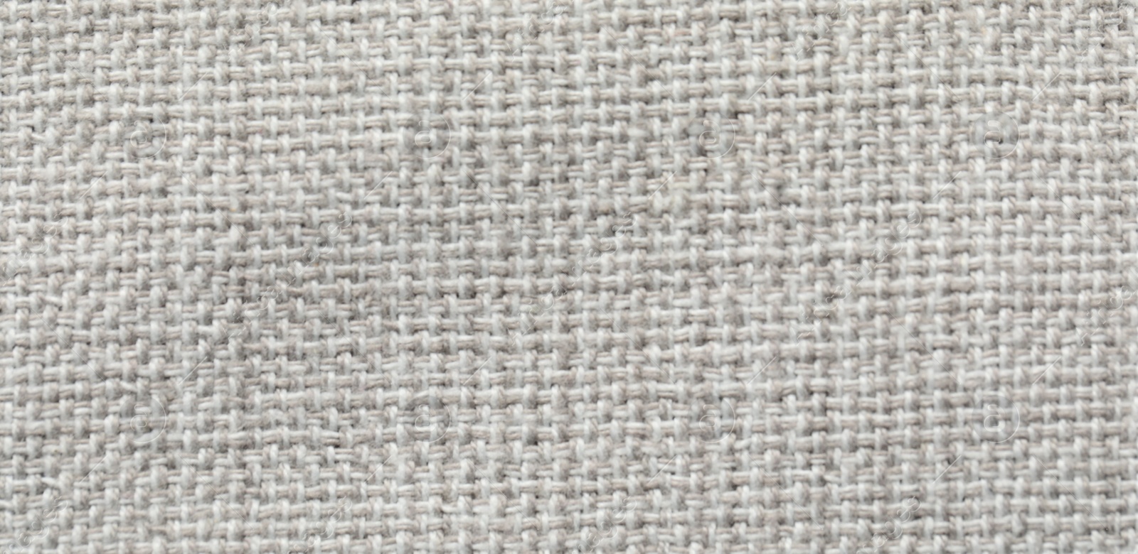 Photo of Texture of soft light grey fabric as background, top view