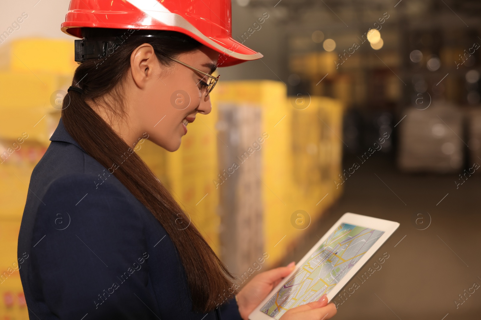 Image of Manager with tablet working at warehouse. Logistics center