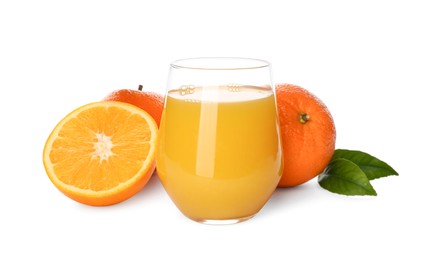 Photo of Orange juice, fresh fruits and green leaves on white background