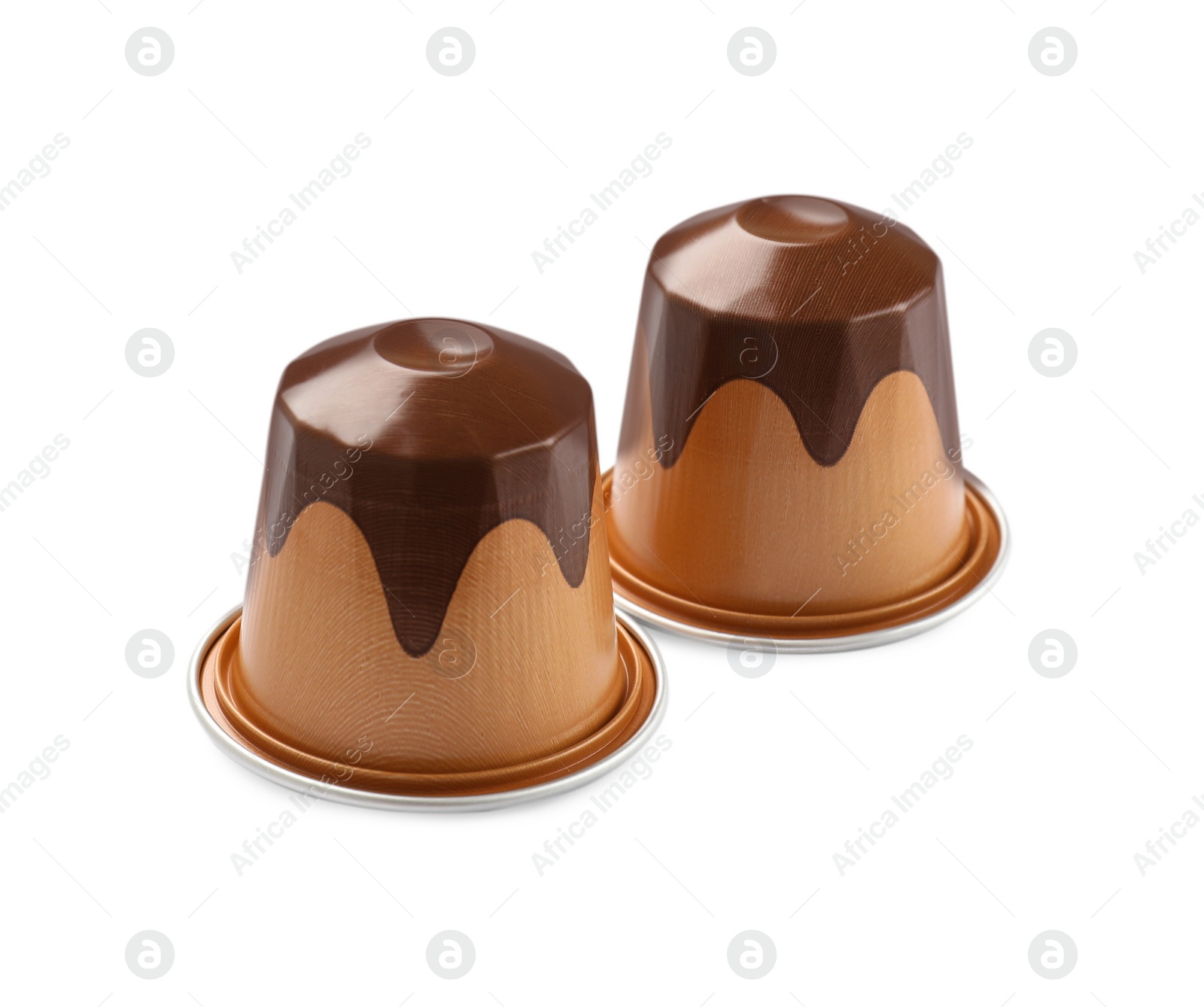 Photo of Two plastic coffee capsules isolated on white