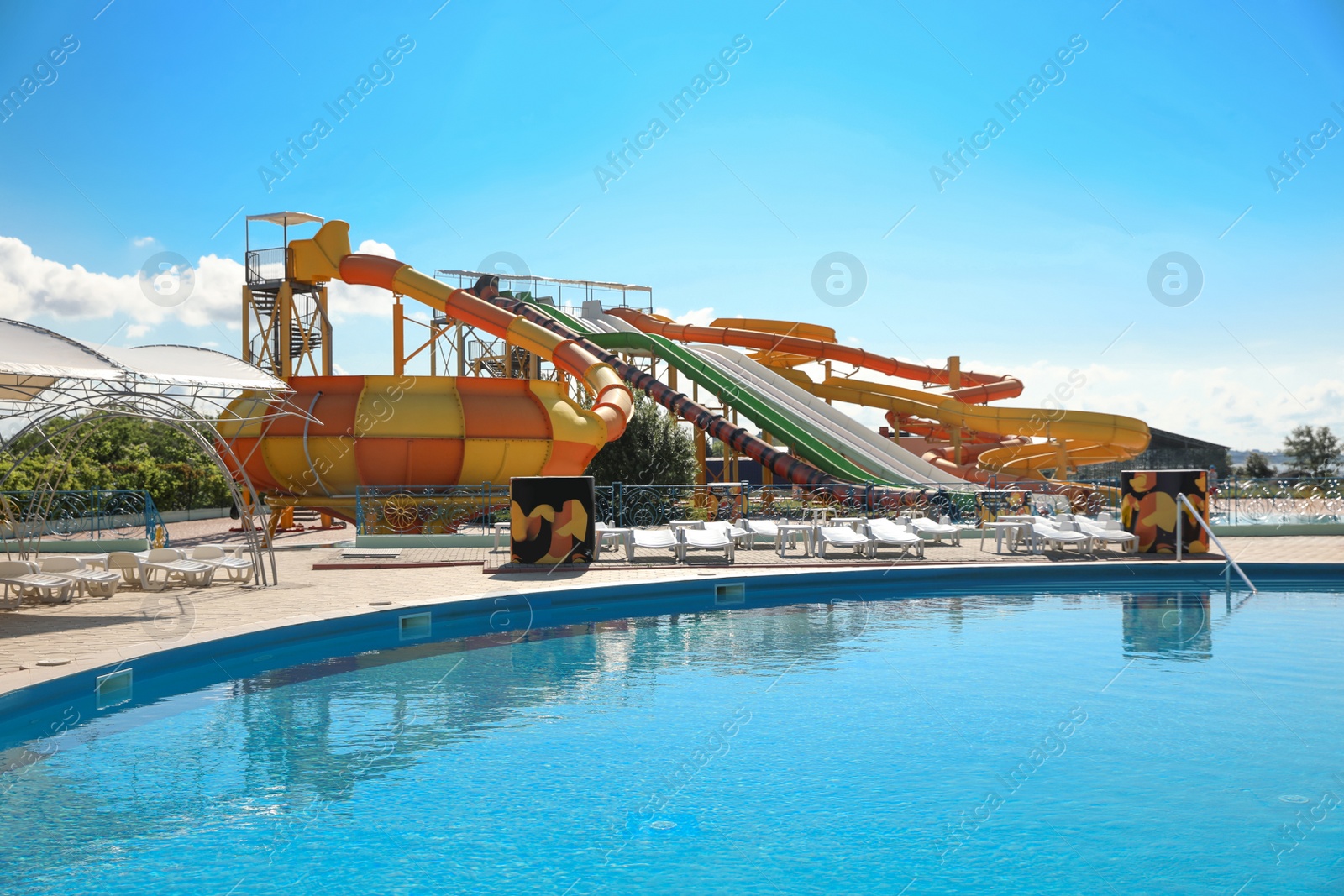 Photo of Water park with swimming pool. Summer vacation