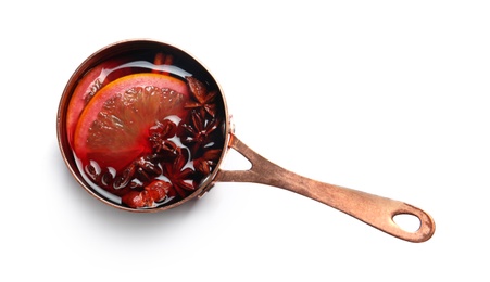 Photo of Saucepan with red mulled wine on white background, top view