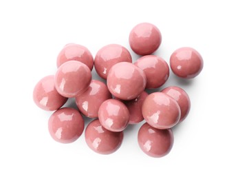 Photo of Delicious pink chocolate candies on white background, top view