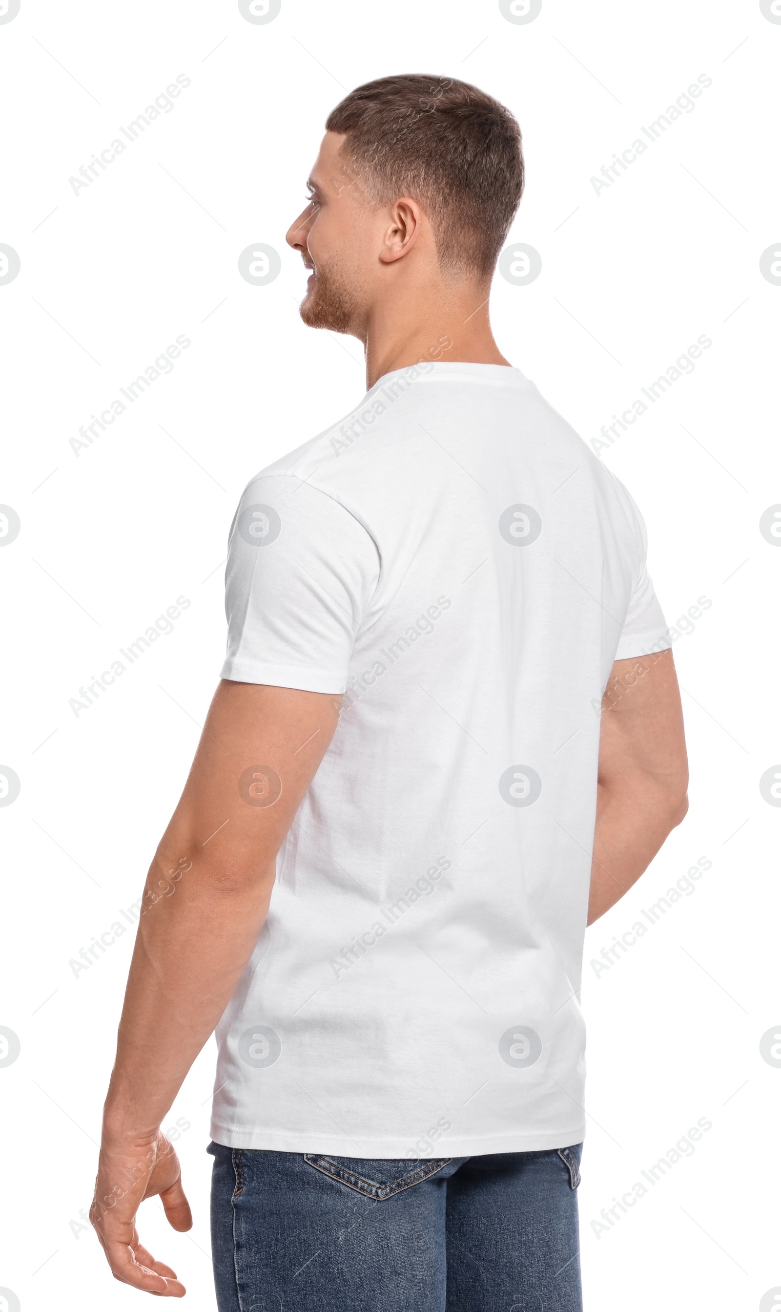 Photo of Man wearing blank t-shirt on white background. Mockup for design